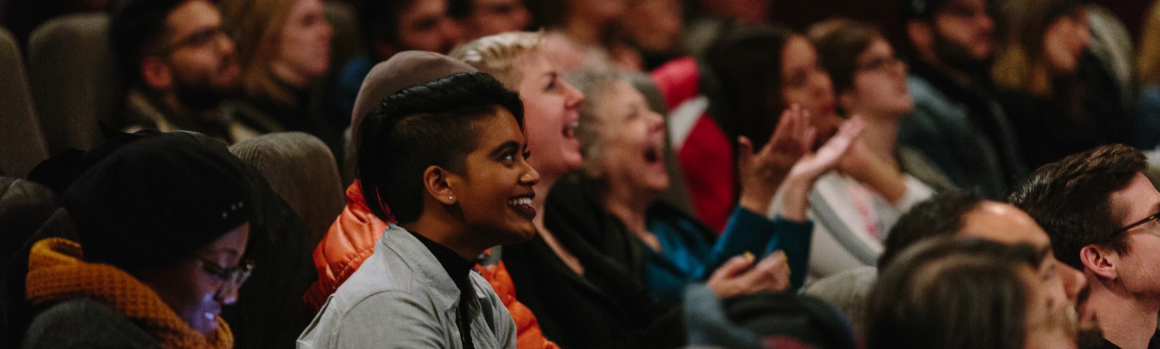 Audience members applauding