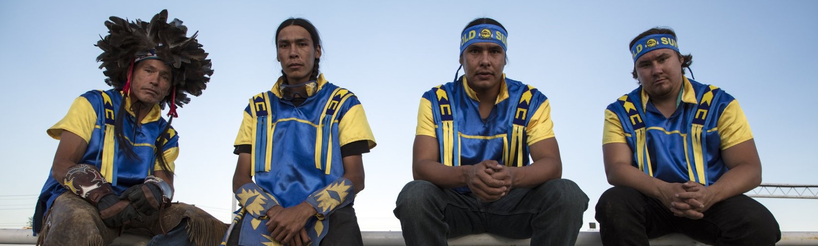 Indigenous men in traditional costume