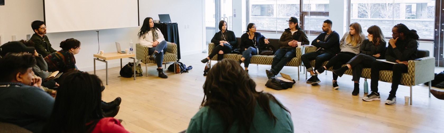 Group of filmmakers sitting in a session