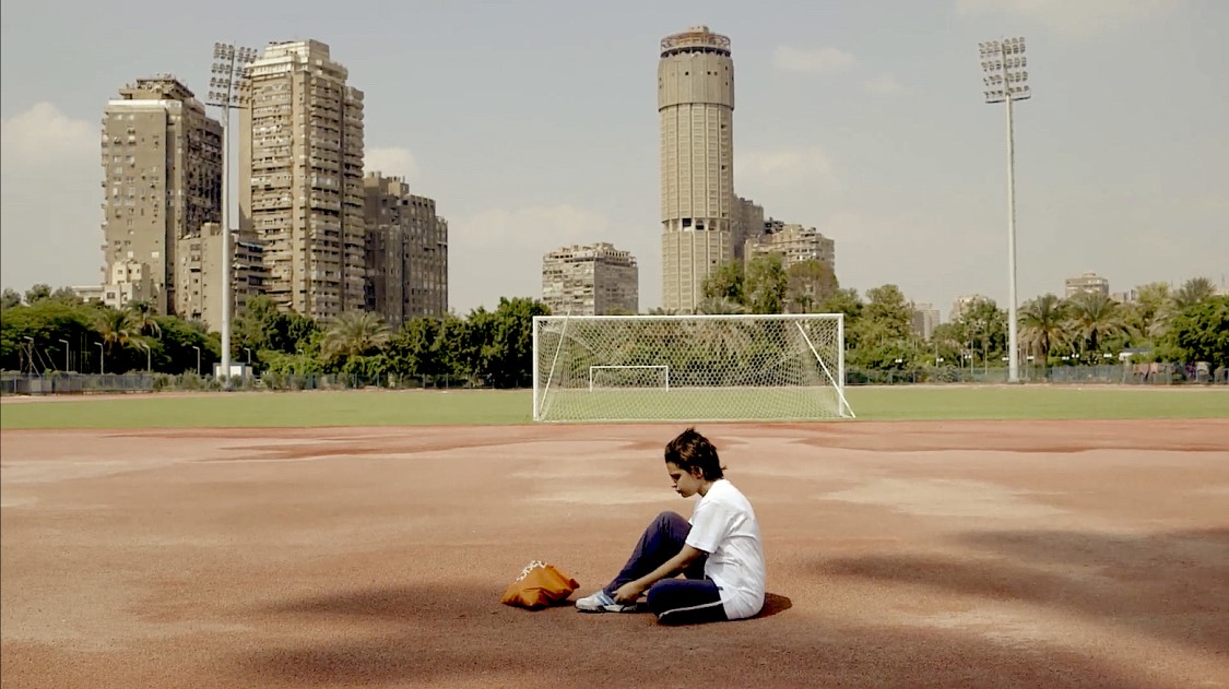 Kid with soccer ball